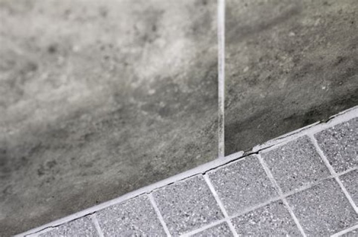 Are cracks in shower floor grout bad?