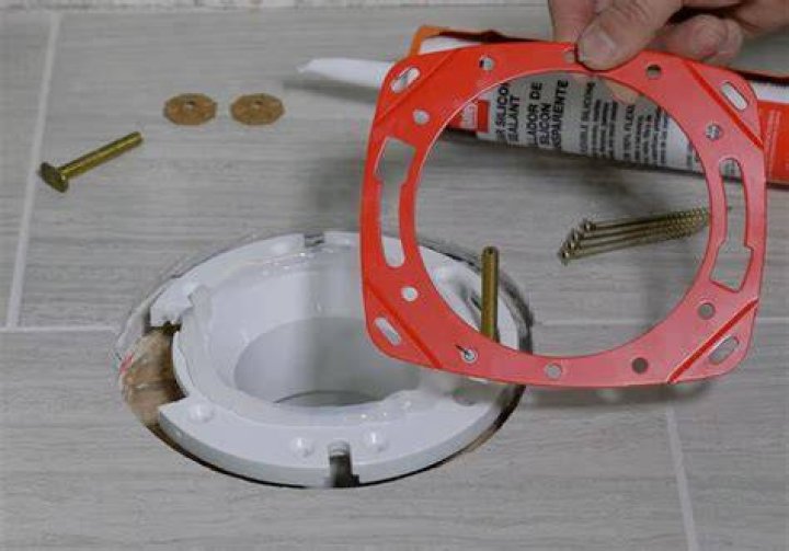 Can a cracked toilet flange be repaired?