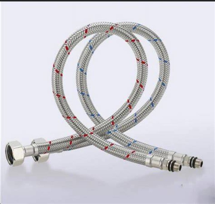 Can a flexible water supply line be replaced in a bathroom?