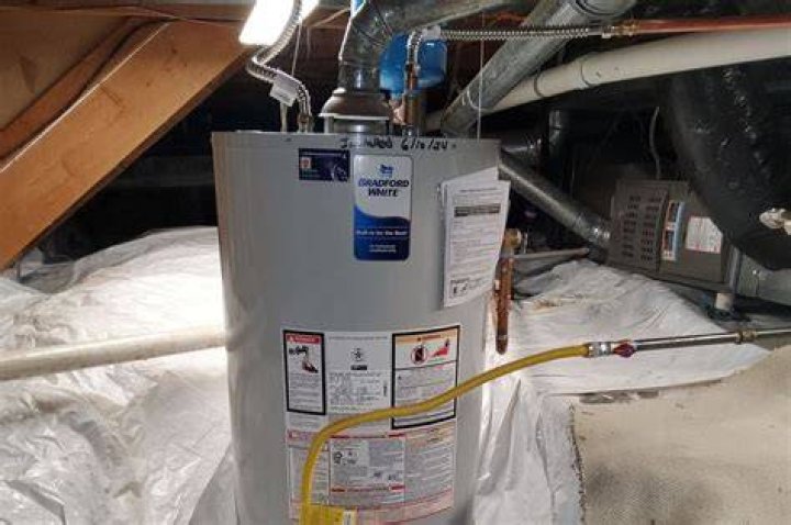 Can a small hole in a hot water heater be repaired?