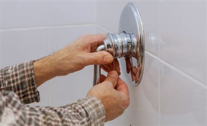 Can you change a bathtub faucet without turning the water off?