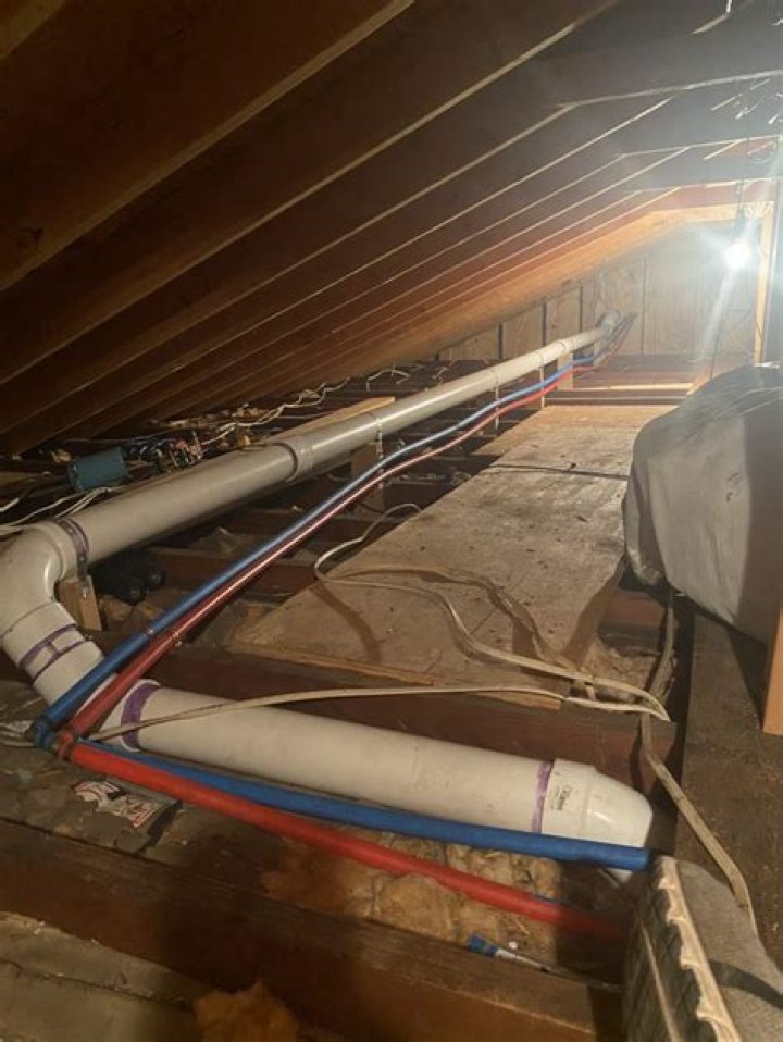 Can you run water lines through an attic?