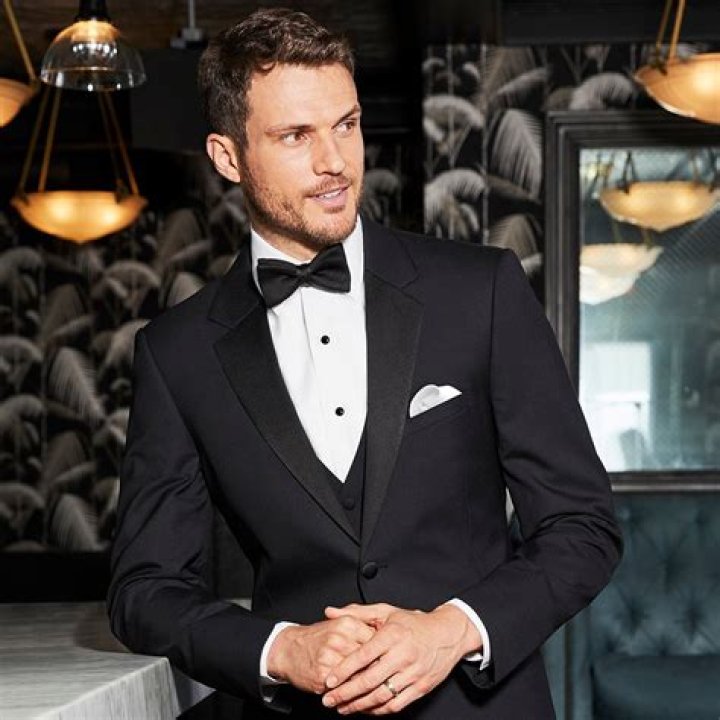 Can you wear a suit as a tuxedo?