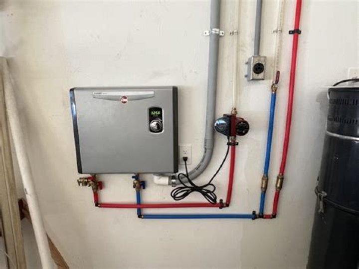 Do electric tankless water heaters need a drain?
