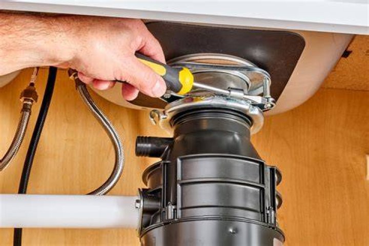 Do I need to turn off water to replace garbage disposal?