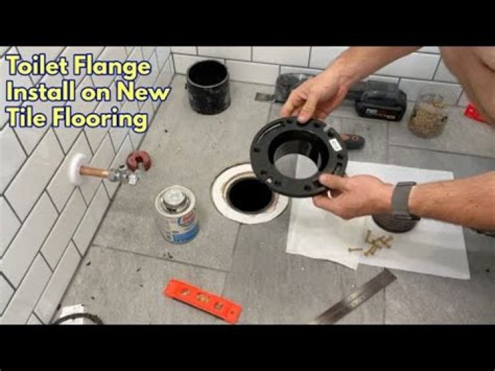 Does toilet get installed on top of tile?