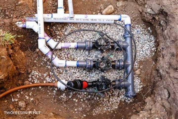 How do I connect my main line to my sprinkler system?