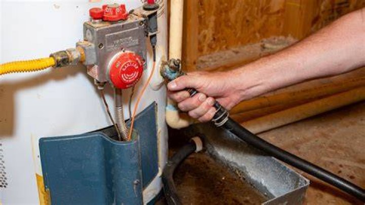 How do I drain and refill my water heater?