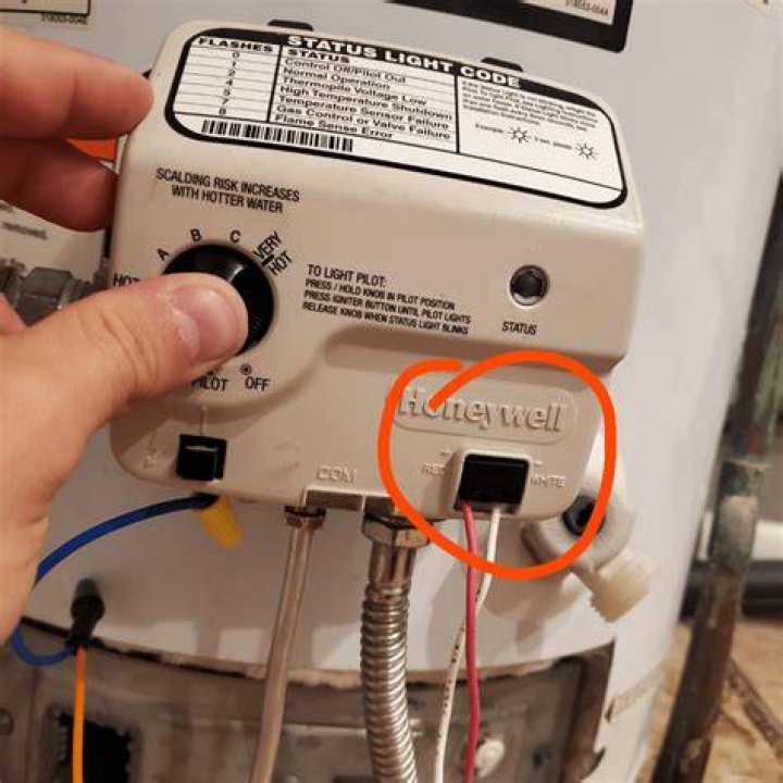 How do I fix the temperature on my water heater?
