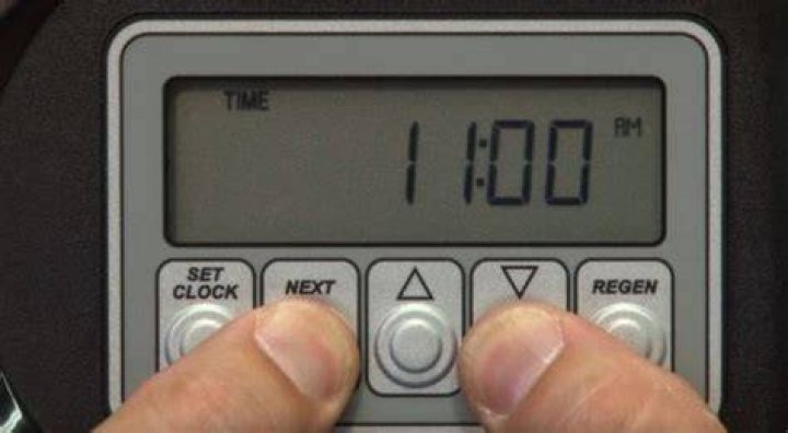 How do I reset my water softener timer?