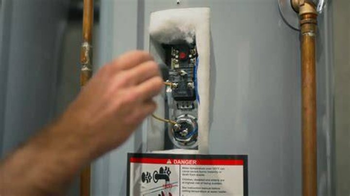 How do I troubleshoot my electric hot water heater thermostat?