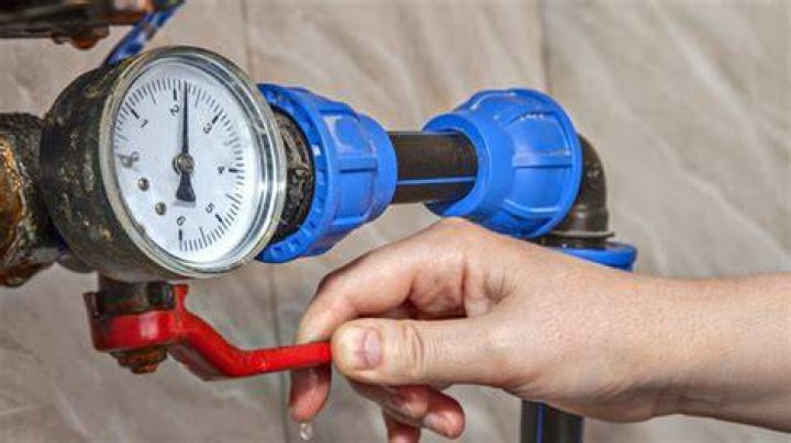 How do I turn off the main water valve?
