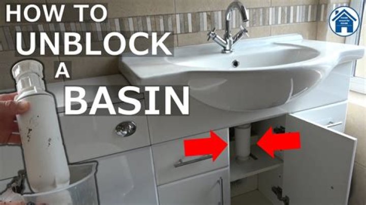 How do I unblock my bathroom sink of water?