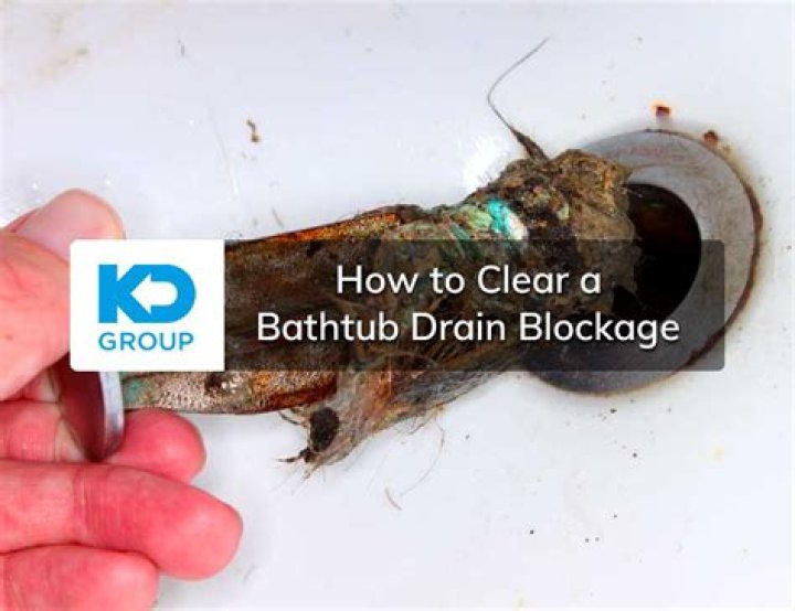 How do you clear a bathtub blockage?