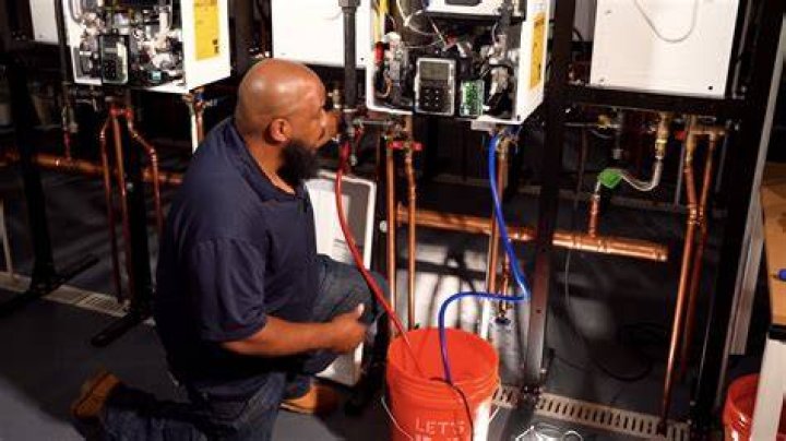 How do you descale a hot water coil?
