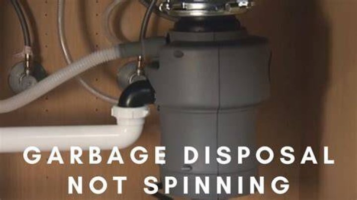 How do you fix a non spinning garbage disposal?