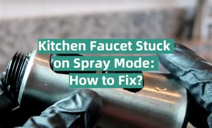 How do you fix a stuck kitchen faucet spray?