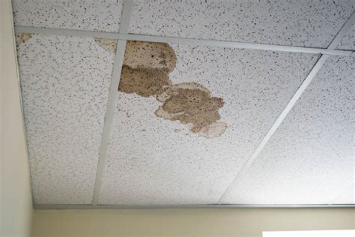 How do you fix brown spots on the ceiling?