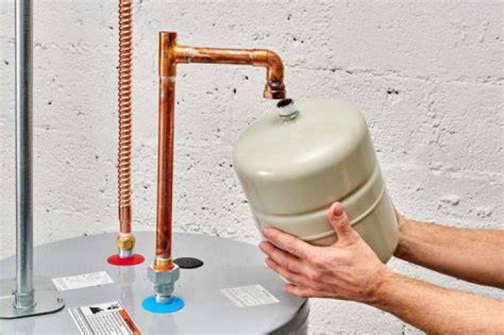 How do you install an expansion tank on a water heater?