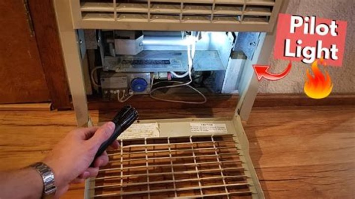 How do you light the pilot on an old wall heater?