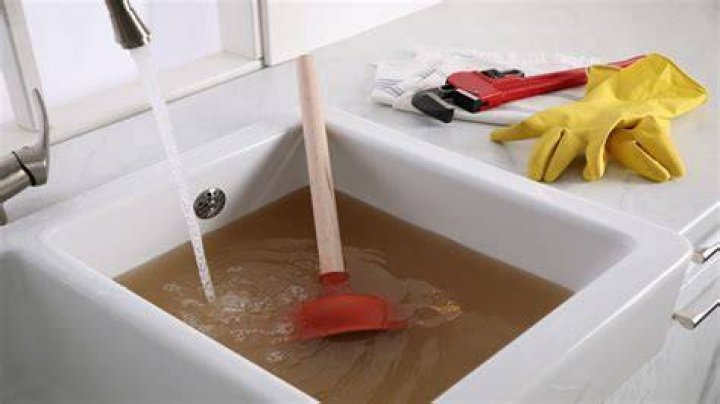 How do you reconnect a sink plunger?
