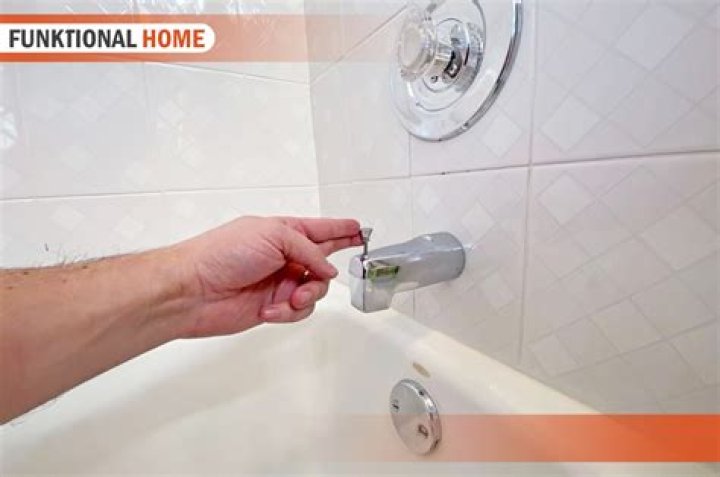 How do you remove a Danze shower diverter?