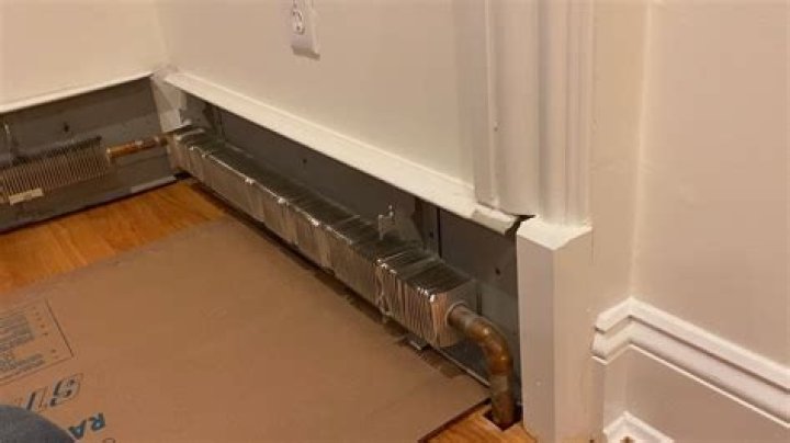 How do you remove a forced hot water baseboard heater?
