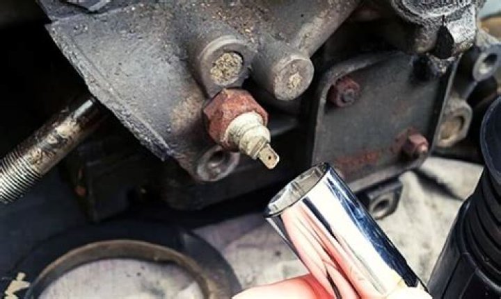 How do you remove a stuck pressure relief valve?
