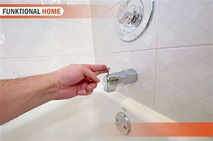 How do you remove a stuck shower diverter?
