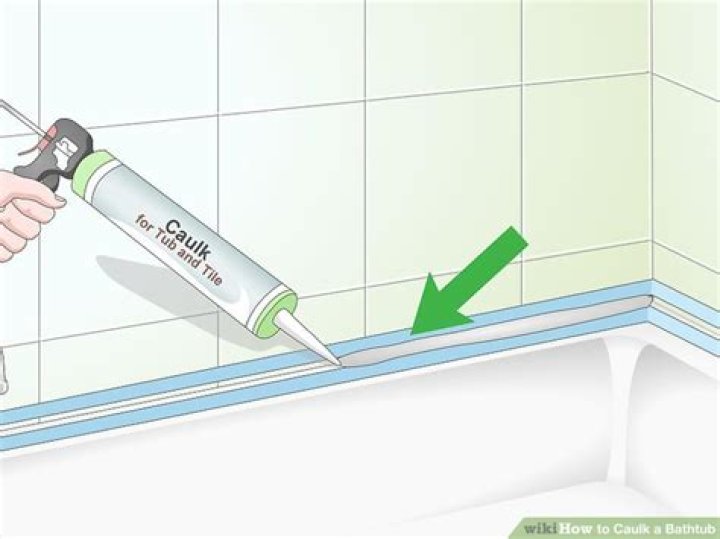 How do you remove caulk from bathtub spout?
