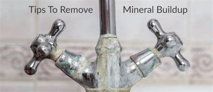 How do you remove mineral deposits from faucets?