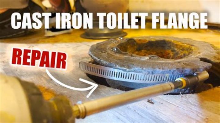 How do you replace a cast iron toilet flange?