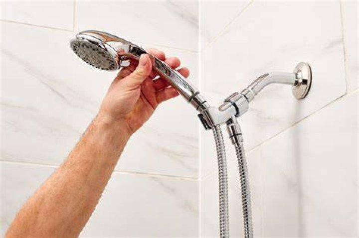 How do you replace a handheld shower head?