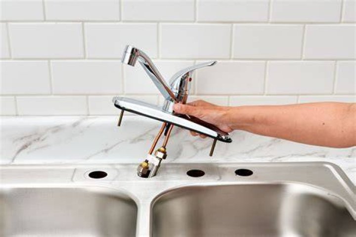 How do you replace a Moen single handle kitchen faucet?