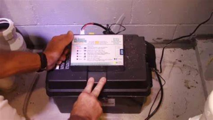 How do you test a sump pump battery?