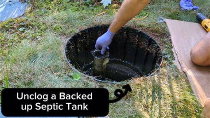 How do you unclog a septic tank field?