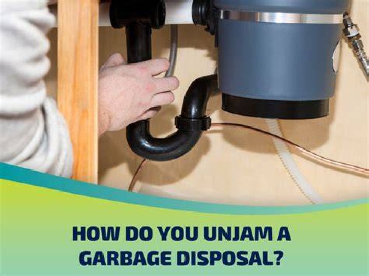 How do you unjam a garbage disposal without a wrench?