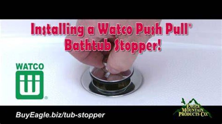 How does a push and pull drain stopper work?