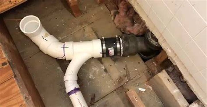 How does a sink drain connect to a toilet?
