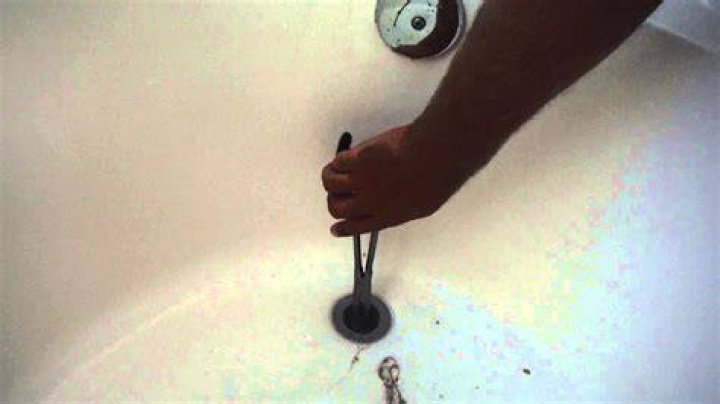 How to fix a slow draining bathtub drain?