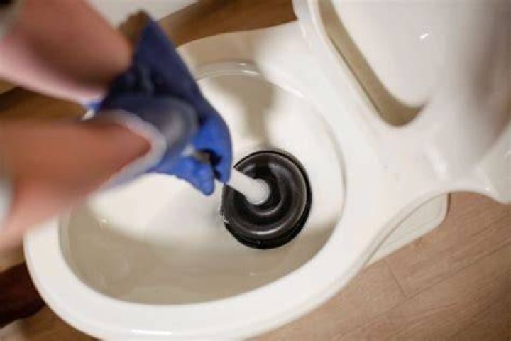 How to unclog toilet when plunger won t?