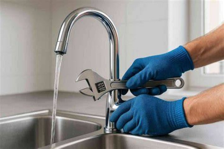 What causes the water to flow out of the tap?