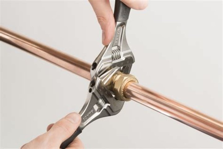 What do you use to tighten the fittings on the drain pipes?