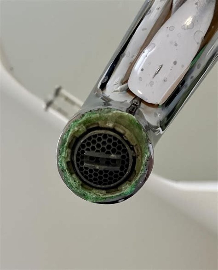 What is the green deposit on my faucet?