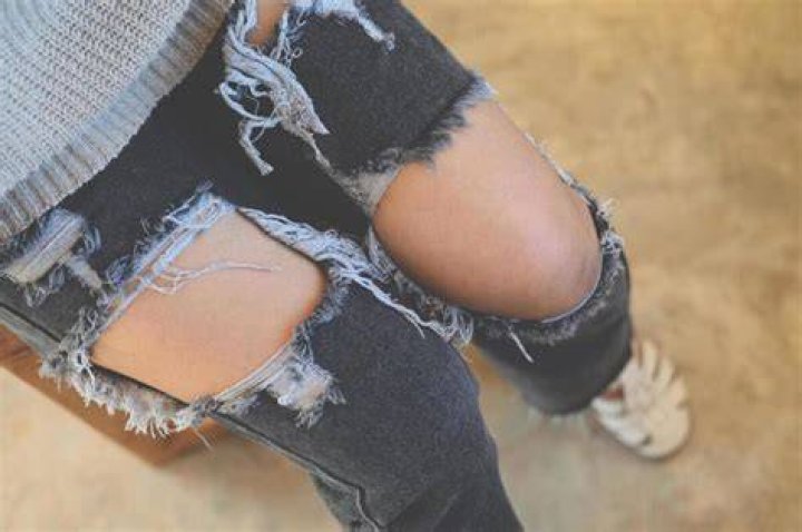 What is the meaning of torn clothes?