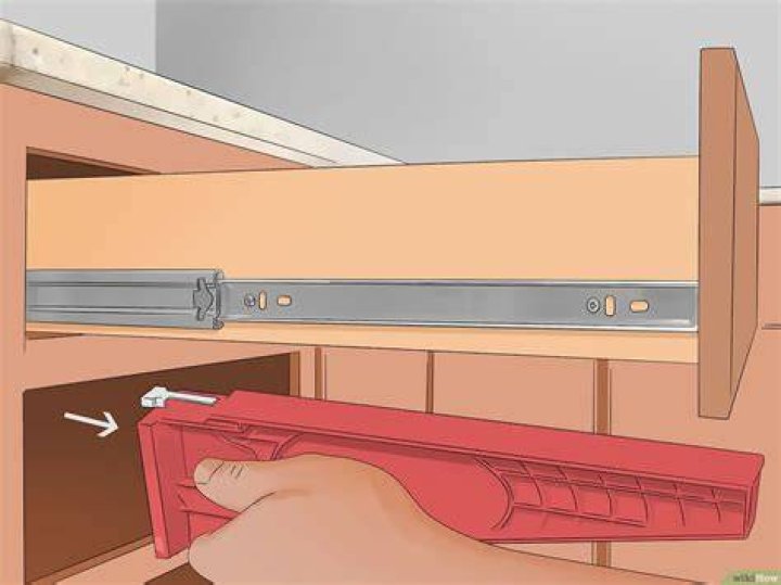 What is the smallest number of socks you must take out of the drawer if there was a 40 watt bulb switched on in the room your answer?