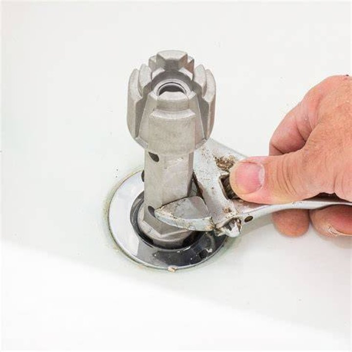 What tool do you need to remove a tub drain?