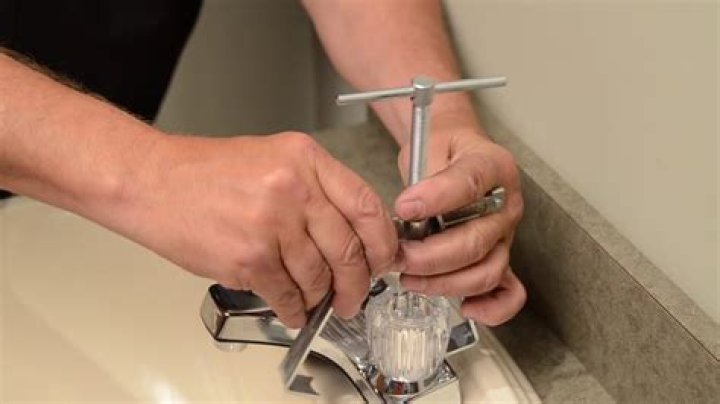 What tool takes off shower handle?