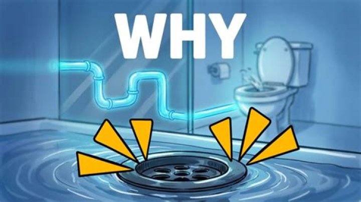 When does the toilet bubble when the tub drains?
