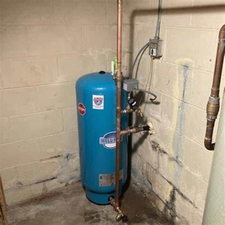 Who do I call to replace a pressure tank?